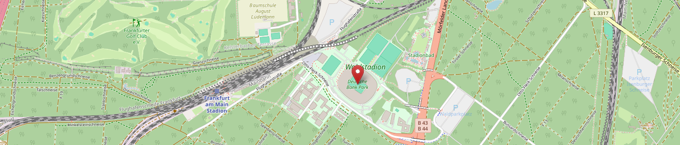 Eine digitale Karte, die die Lage des Olympiastadions in Berlin zeigt, markiert mit einer roten Stecknadel, umgeben von Straßen, Bahnlinien, grünen Parkflächen und Parkplätzen. In der Nähe befindliche Sehenswürdigkeiten und Straßennamen sind sichtbar.